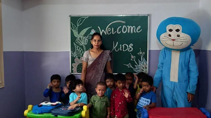 Teacher reading a storybook to a group of children
