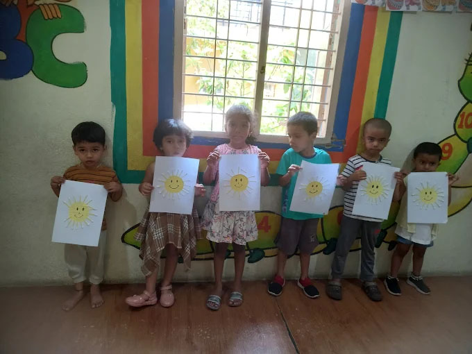 Children painting and doing craft activities